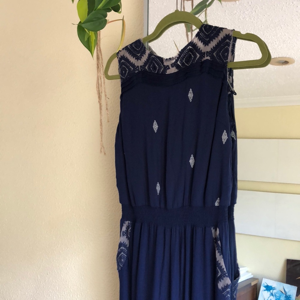 Blue romper with pockets from Chelsea and violet